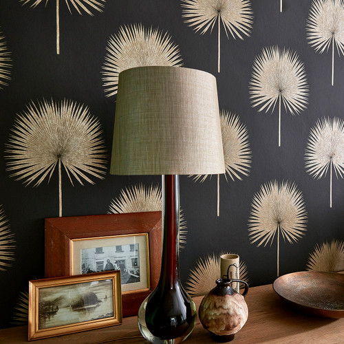 A smart useable wallpaper for a variety of living spaces, Fan Palm from Sanderson creates an elegant silhouette shape with fine line work bringing a subtle textural look. Metallic inks offset with the Linen, Charcoal and Rhodera colourways to dramatic effect.