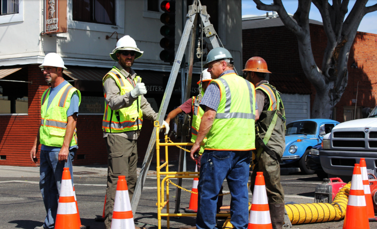 road construction workers working