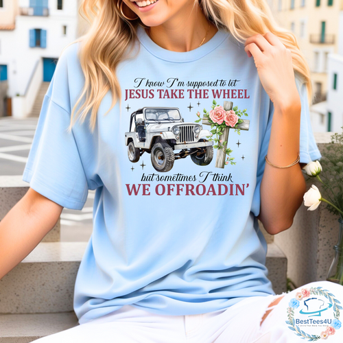 Unisex t-shirt with "I Know I'm Supposed to Let Jesus Take the Wheel" text, a humorous Christian-themed design with Southern style.