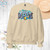 Unisex sweatshirt with "Swim Mom" text, ideal for swimming moms who love supporting their kids at the pool. Perfect for swim meets and casual wear.