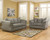 Signature Design Darcy Sofa And Loveseat In Cobblestone