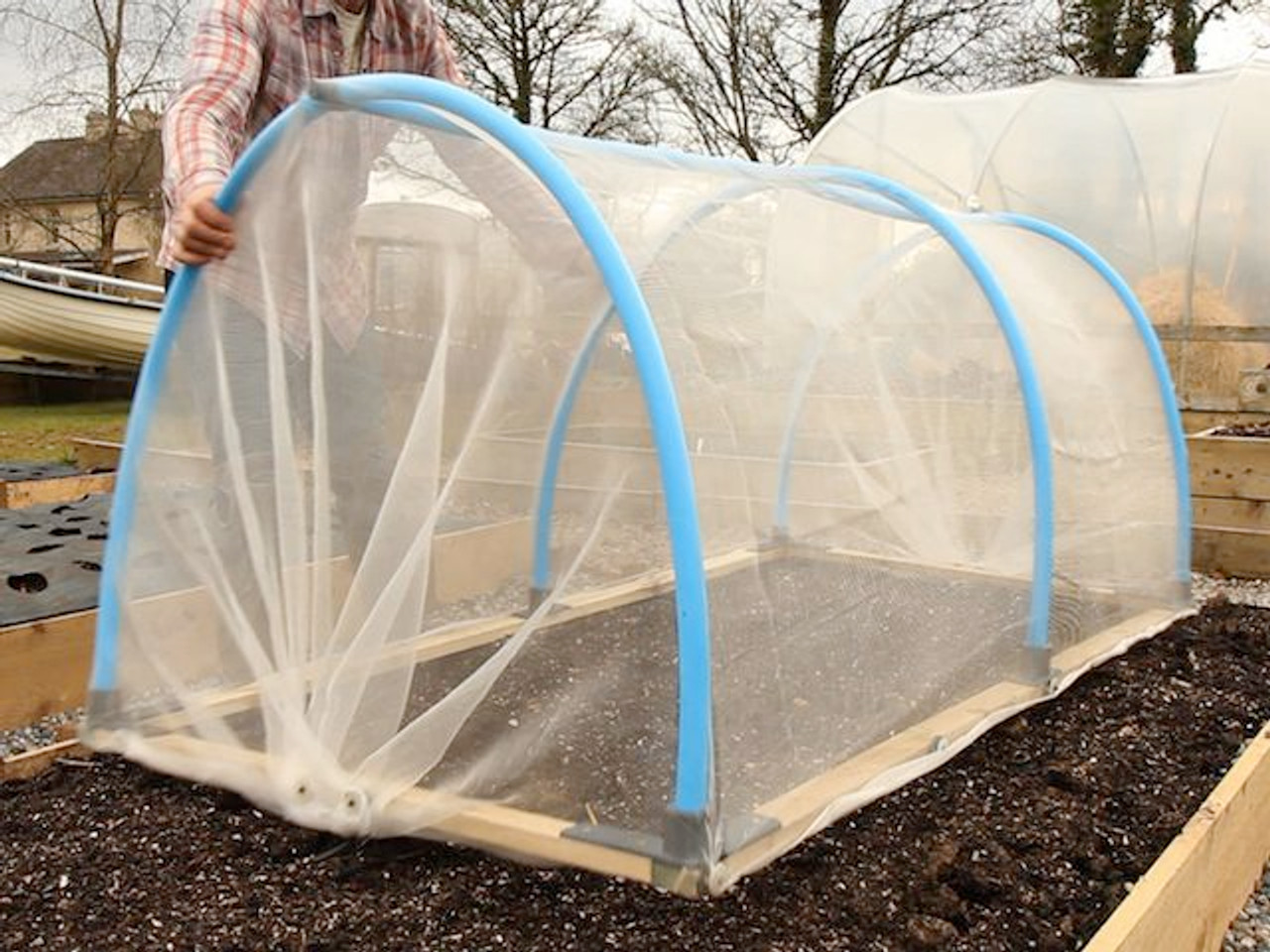 mini polytunnel with mesh cover