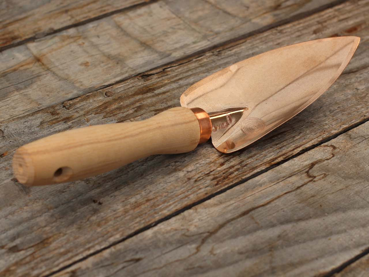 Deva copper trowel