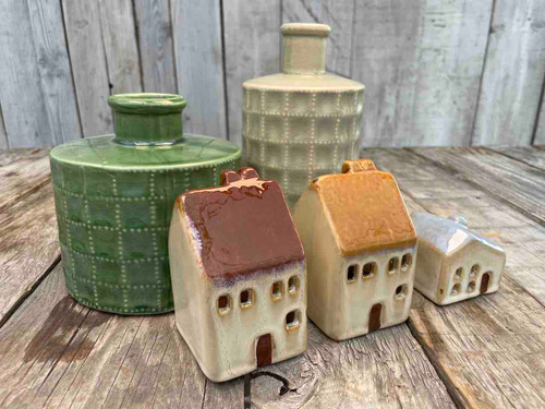 Ceramics hamper with vases and light up decorative houses