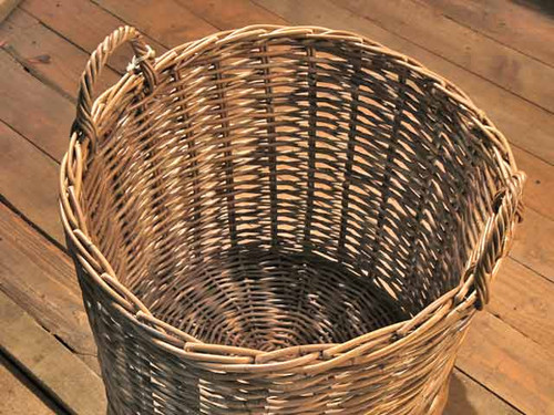 Giant round wicker log basket inside