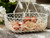 Sophie Conran small harvest basket holding eggs Sophie Conran small harvest basket holding eggs