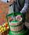 presses fruit by turning the crossbeam