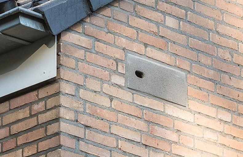 a swift nesting space built in to a building facade.