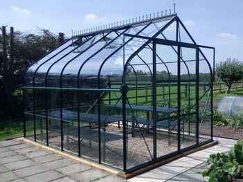 Saturn contemporary greenhouse