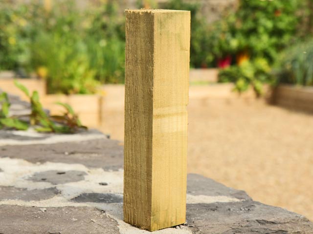 chunky timber corner posts for gardens
