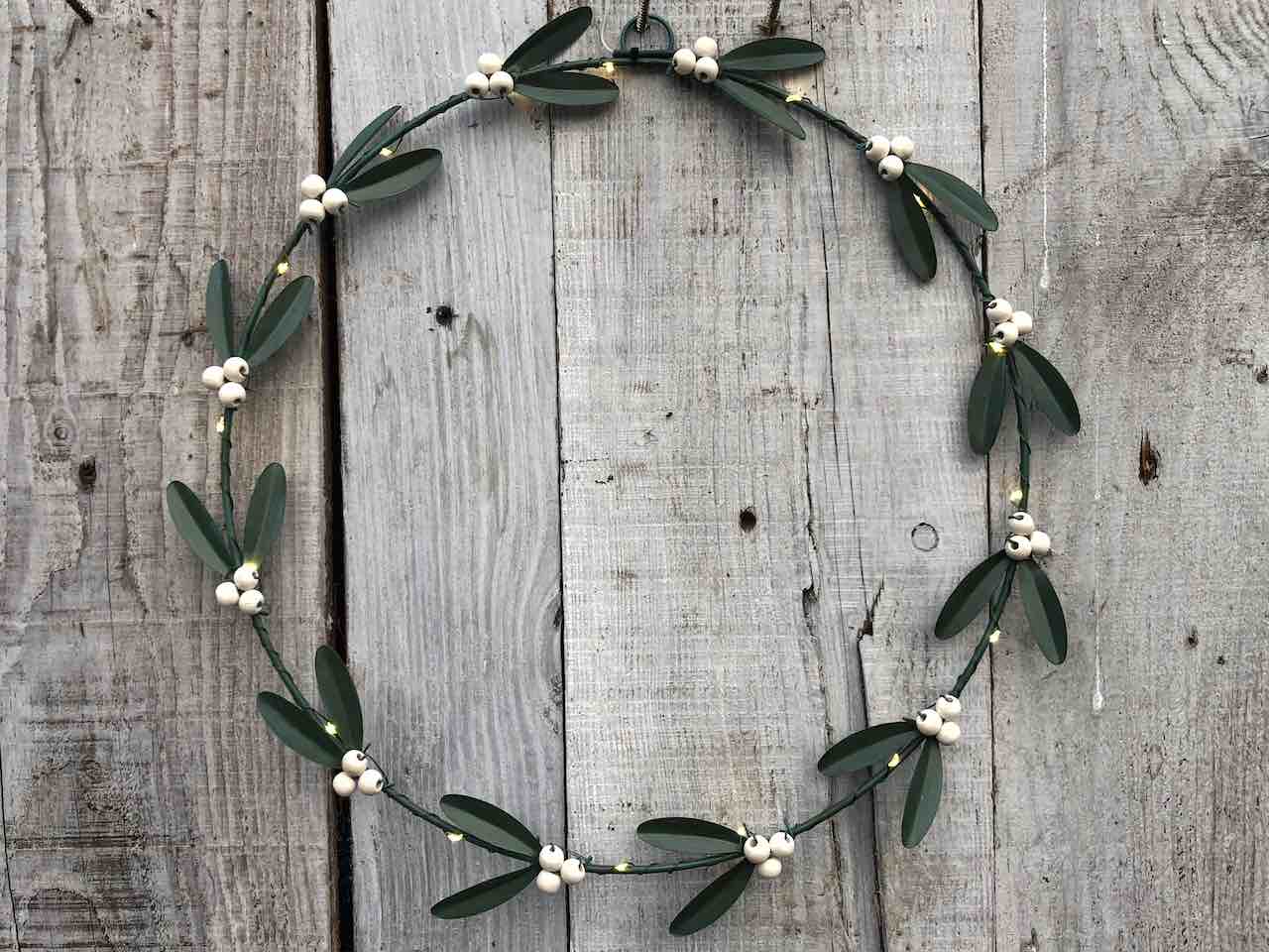 Mistletoe wreath with berries and led lights