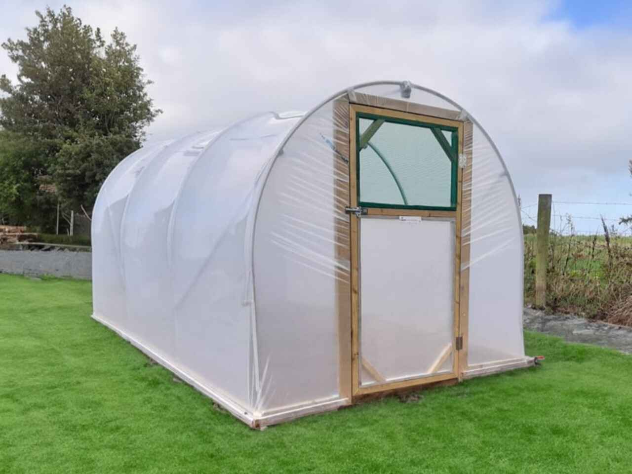 2.4m (8ft) wide polytunnel in a garden