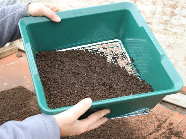 sifting through earth with the sieve