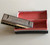 M. Hohner's Mini Historic Harmonica / Made in Germany / Hohner 550/20 C PUCK - Key of C / Stainless steel cover, brass reed plates, plastic comb - original box / Paris 1900 - Chicago 1893 (400912600594)