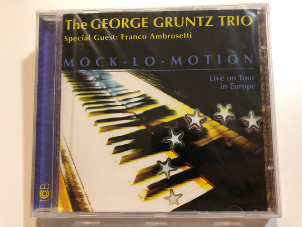 The George Gruntz Trio , Special Guest: Franco Ambrosetti – Mock-Lo-Motion / Live On Tour in Europe / TCB Records Audio CD 1995 / TCB 95552