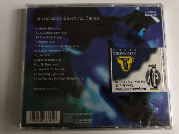 Janis Siegel – A Thousand Beautiful Things / Janis Siegel sings songs written by: Bjork, Annie Lennox, Nellie McKay, Suzanne Vega, Stevie Wonder, and others... / Telarc Audio CD 2006 / CD-83630
