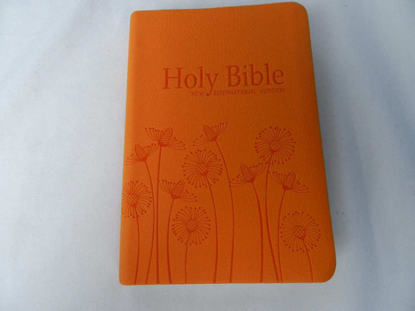 New International Version NIV Holy Bible with Thumb Index, Tangerine Orange Vinyl Bound with Dandelion Motif