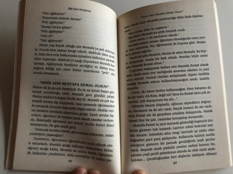 Bir Dahi Yetişiyor by Songül Saydam, Yaşar Öztürk / A genius in the making - The childhood of Mustafa Kemal Atatürk, Turkey's first president / Mustafa Kemal Atatürk'ün çocukluğu / Iyi Insanlar 2008 / Paperback (9789759992897)