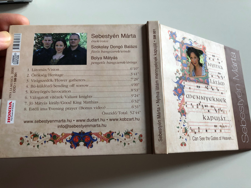 Sebestyén ‎Márta – Nyitva latam mennyeknek kapujat = I Can See The Gates Of Heaven... / Viva La Musica ‎Audio CD 2008 / SM 001