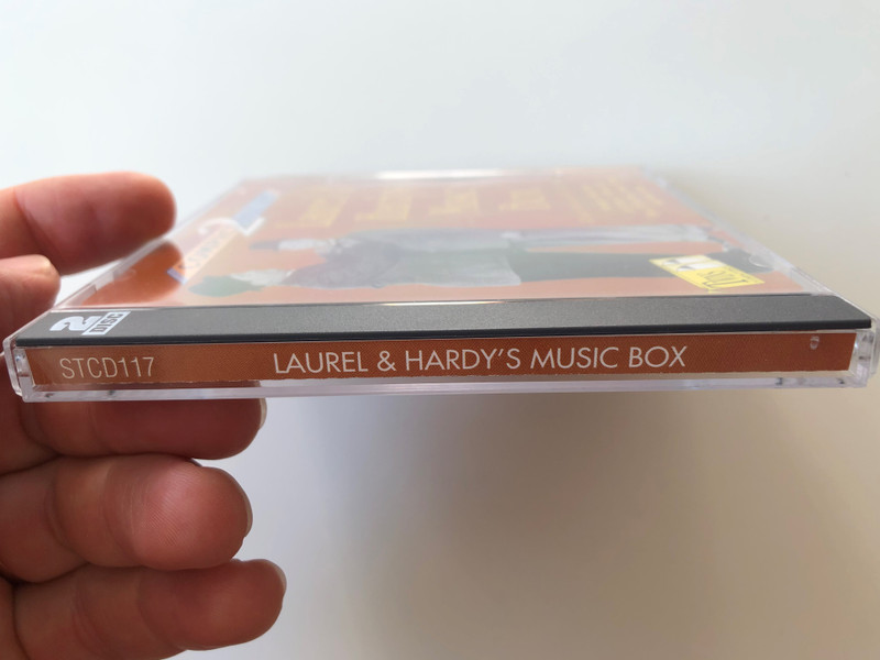 Laurel And Hardy's Music Box / Ronnie Hazlehurst And His Orchestra ‎/ Includes: In My Canoe, Let's Face It, Dash & Dot, 'Sons Of The Desert' Main Theme and many more / Tring International PLC ‎2x Audio CD / STCD117
