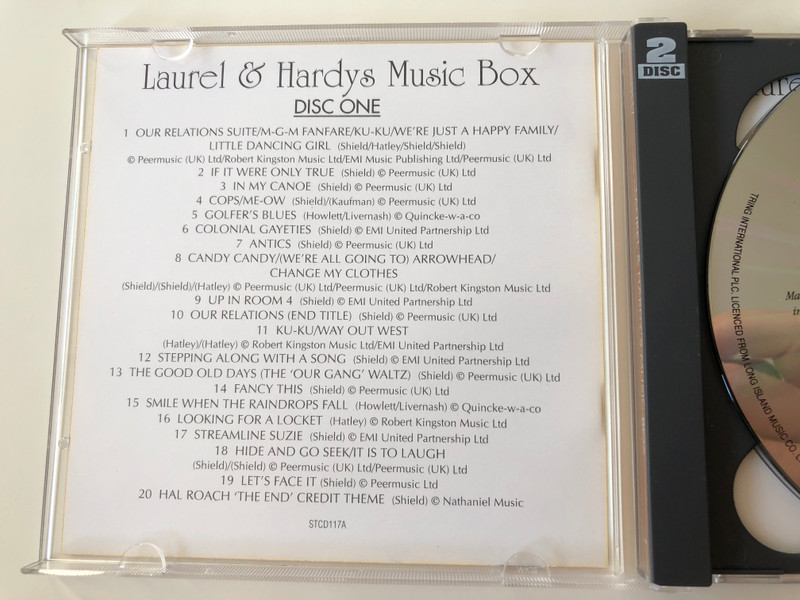 Laurel And Hardy's Music Box / Ronnie Hazlehurst And His Orchestra ‎/ Includes: In My Canoe, Let's Face It, Dash & Dot, 'Sons Of The Desert' Main Theme and many more / Tring International PLC ‎2x Audio CD / STCD117