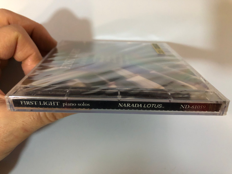 FIRST LIGHT piano solos / Introducing: Adrian Carr, Mia Jang, Glenn Paul, Sheila Larkin, John B. deHaas / Narada Lotus ‎Audio CD 1996 / ND-61059