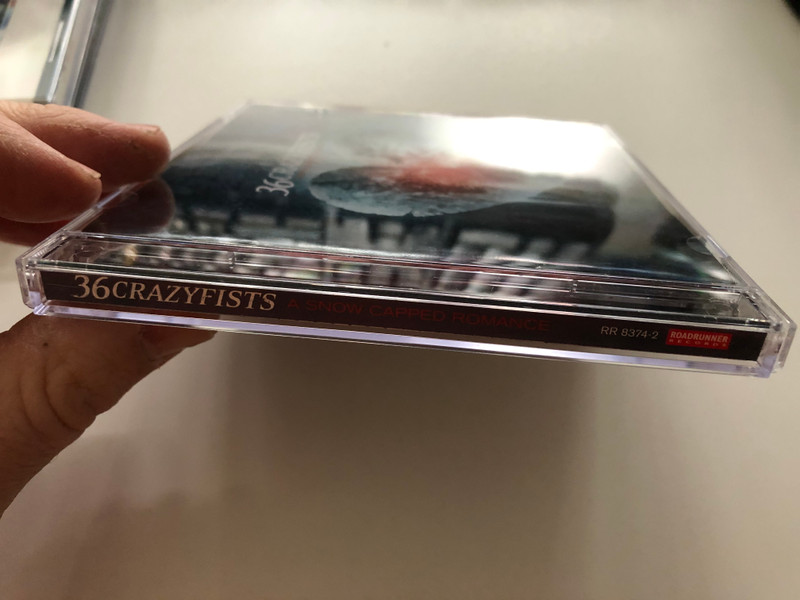 36 Crazyfists – A Snow Capped Romance / Roadrunner Records Audio CD 2004 / RR 8374-2