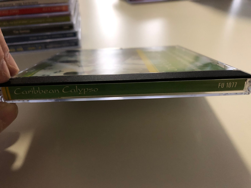 Caribbean Calypso - Ti Calypso, Femme De Terres Dechirees, Pacific, Nouvel Horizon, Le Salsa Vini, Douvan, L'Argent Du Demon, Graine De Futur / Fox Music Consolidated Ltd. Audio CD Stereo / FU 1077