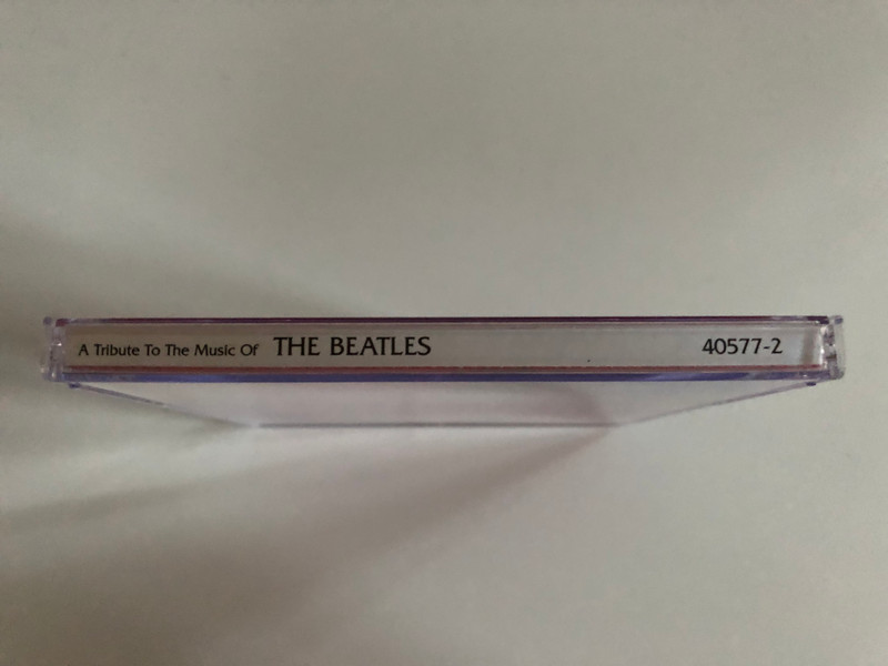 A Tribute To The Music Of The Beatles - Performed by The Kavans / Including: Penny Lane, I Want To Hold Your Hand, She Loves You, Hey Jude, and many more / Cosmopolitan Audio CD 2000 / 40577-2