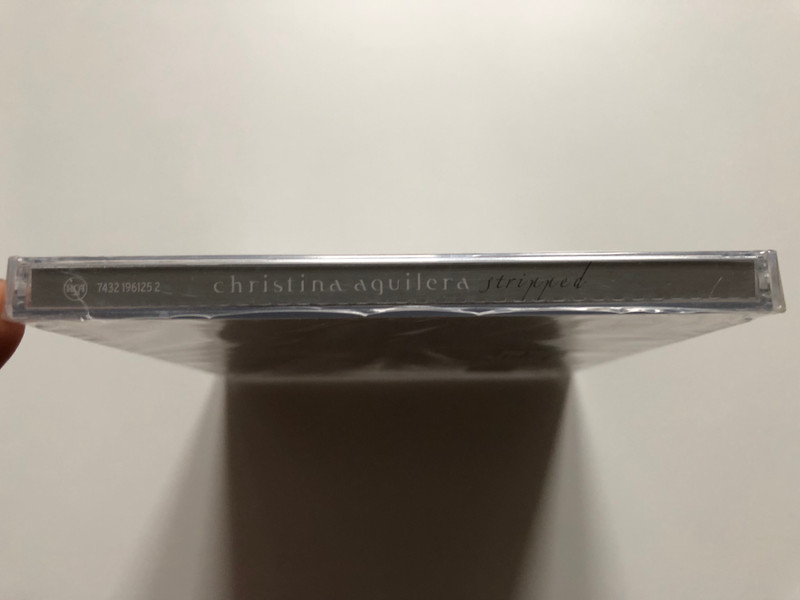 Christina Aguilera – Stripped / Includes the hit singles ''Beautiful'', Dirrty'', ''Fighter'', ''Can't Hold Us Down'' and ''The Voice Within'' / RCA Audio CD 2002 / 7432 196125 2