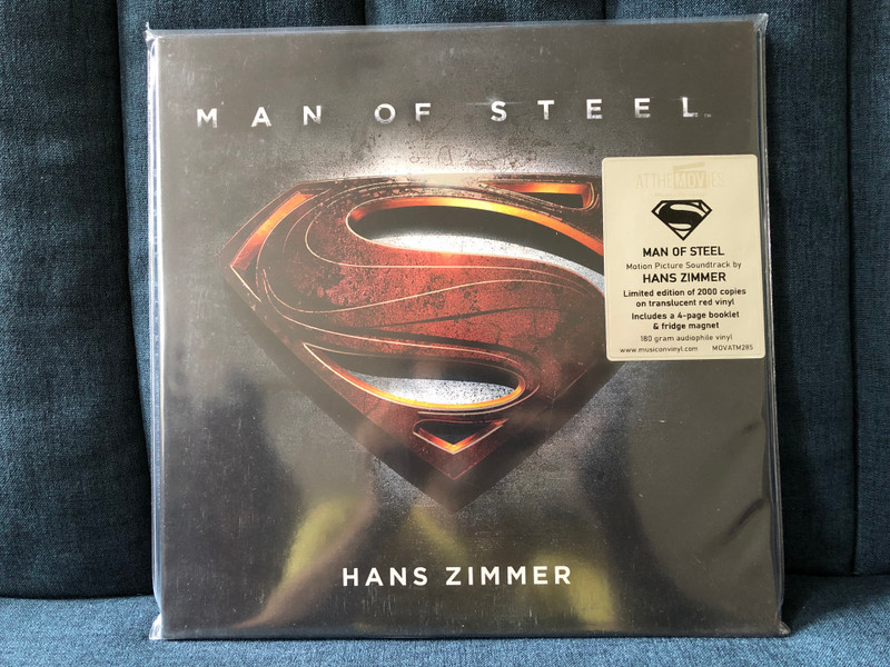 Man Of Steel - Hans Zimmer / Motion Picture Soundtrack By Hans Zimmer. Limited edition of 2008 copies on translucent red vinyl. Includes a 4-page booklet & fridge magnet. 180 gram audiophile vinyl / Music On Vinyl 2x LP 2013 / MOVATM285