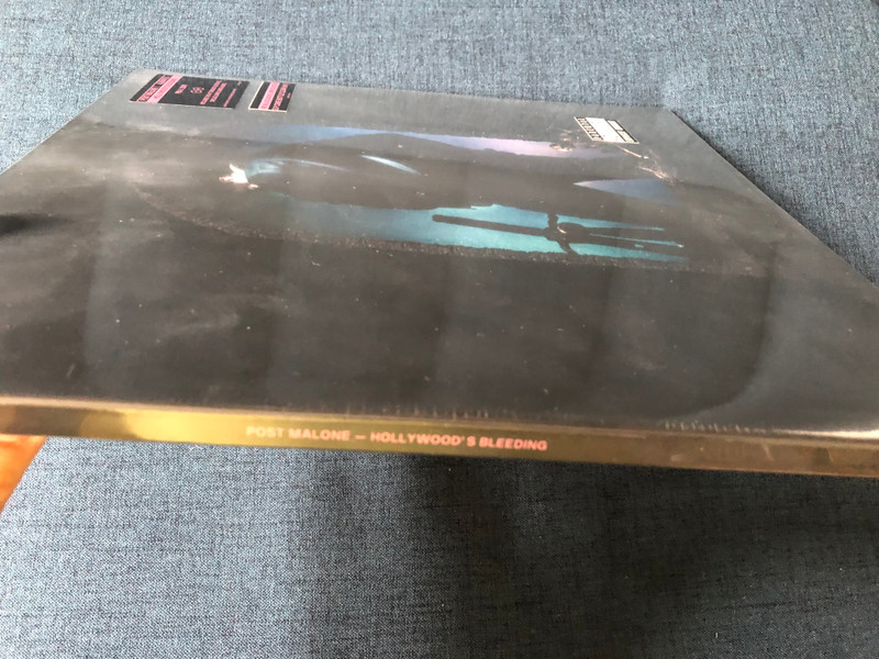 Post Malone – Hollywood's Bleeding / Includes The Hit Singles Goodbyes, Circles, Sunflower & More. / Retail Exclusive Limited Edition. 2LP Coke Bottle Clear Vinyl / Republic Records 2x LP 2019 / 00602508305528