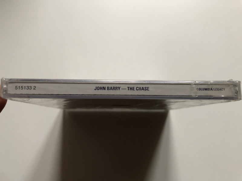 Columbia Pictures Presents Marlon Brando in Sam Spiegel's Production Of The Chase / Music Composed and Conducted by John Barry / Starring Jane Fonda, Robert Redford, E. G. Marshall, Angie Dickinson / Columbia Audio CD 2004 / 515133 2