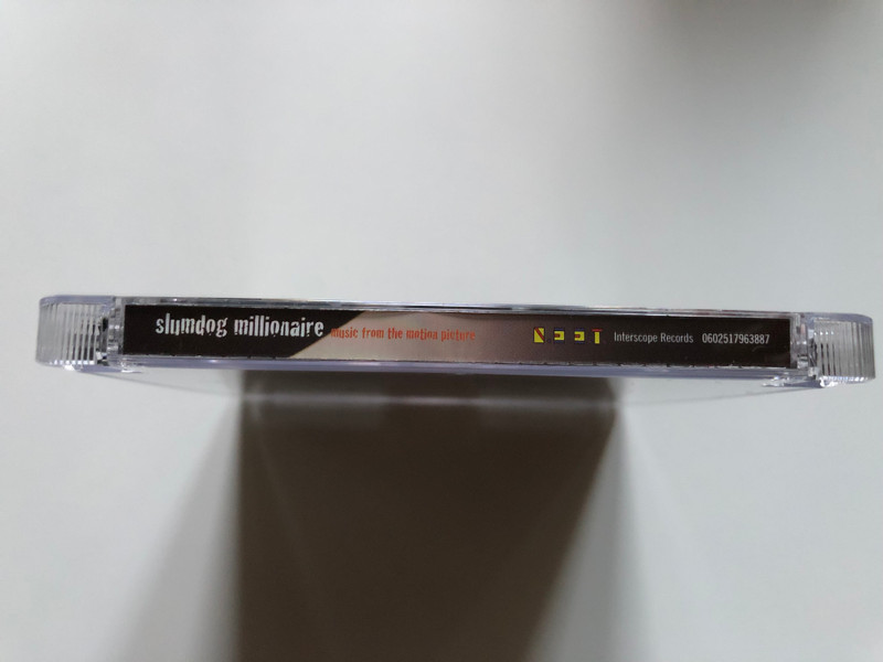 Slumdog Millionaire (Music From The Motion Picture) - Featuring Music And Score From A R Rahman / Interscope Records Audio CD 2008 / 0602517963887