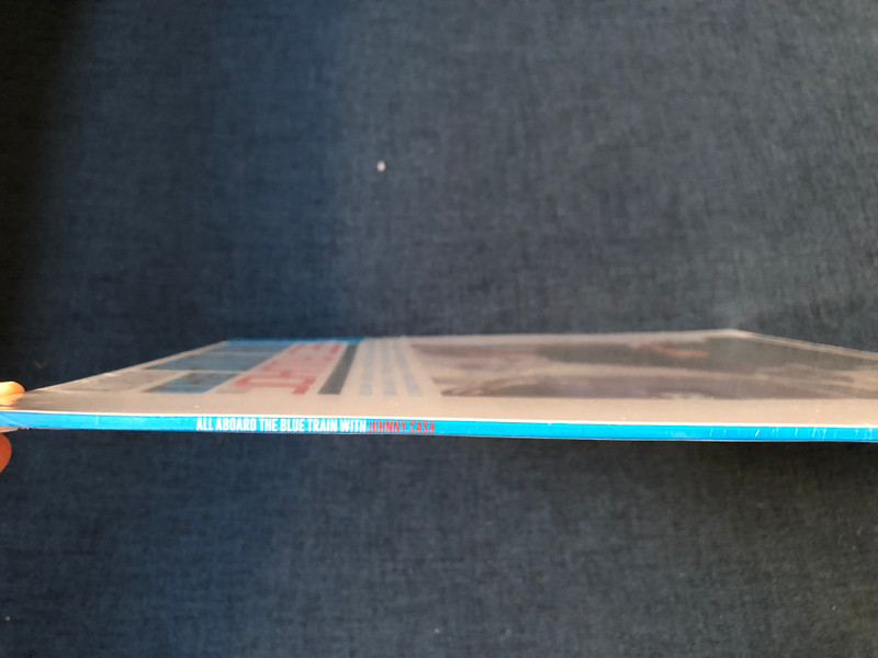 All Aboard The Blue Train with Johnny Cash / Blue Train; There You Go; Hey Porter; Come In Stranger; Goodbye Little Darling; Rock Island Line; Train Of Love; Give My Love To Rose; Folsom Prison Blues / Sun LP 2016 / SUN LP 1270