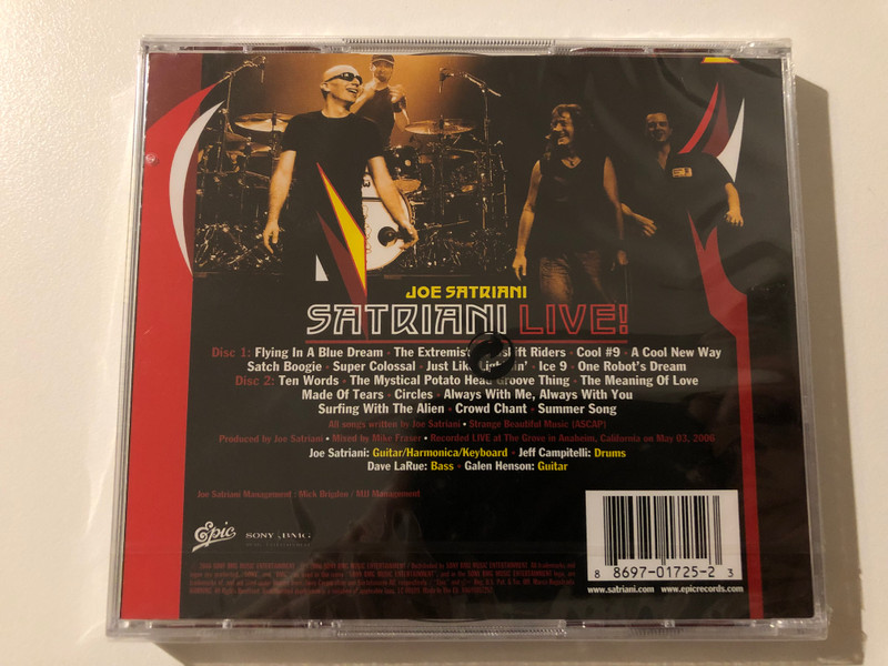 Joe Satriani – Satriani Live! / Double-CD Set, Recorded Live At The Grove, May 2006 / Includes Live Favorites ''Satch Boogie'', ''Flying In A Blue Dream'' And ''Super Colossal'' / Also Available On DVD / Epic 2x Audio CD 2006 / 88697017252