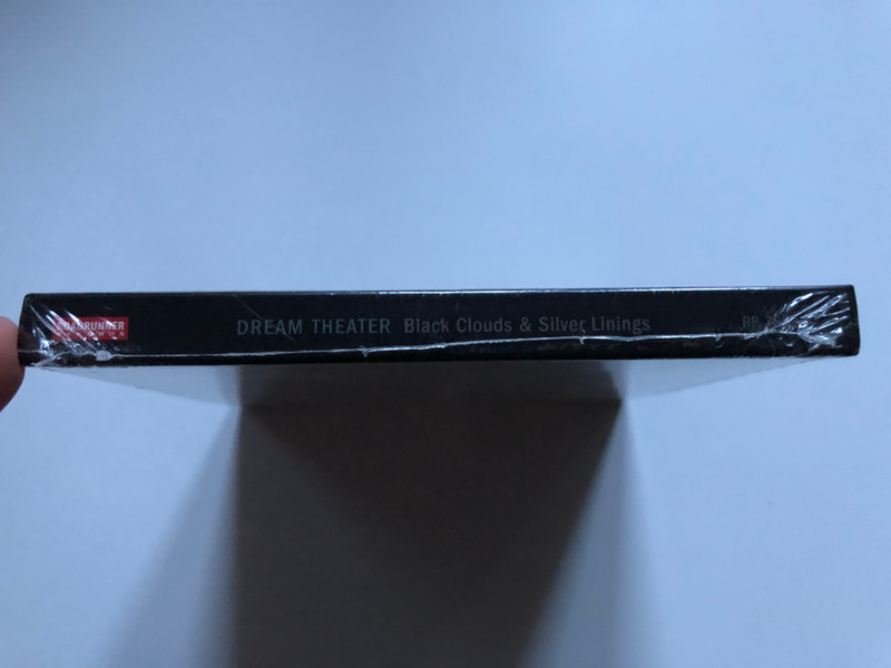 Dream Theater – Black Clouds & Silver Linings / 3 CD Deluxe Edition includes: 6 Newly Recorded Cover Songs, Instrumental Mixes of the Entire Album. Expanded Artwork / Roadrunner Records 3x Audio CD 2009 / RR 7883-2