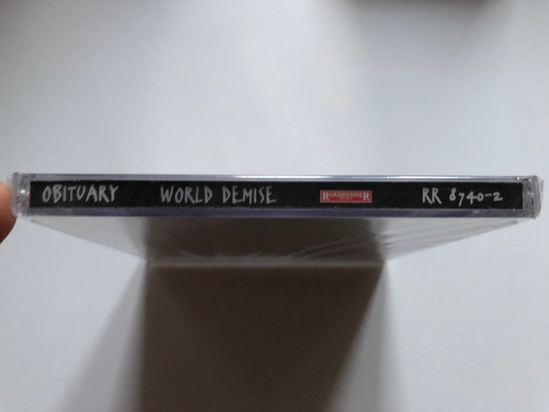 Obituary – World Demise / The Obituary Remasters. Digitally remastered gold disc with new expanded package - sounds better, rocks harder, looks killer! / Roadrunner Records Audio CD 1998 / RR 8740-2