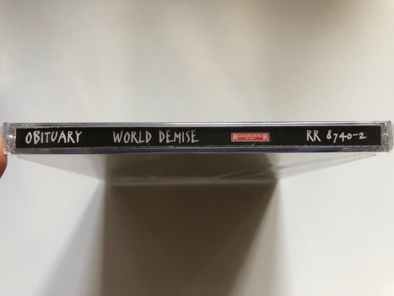 Obituary – World Demise / The Obituary Remasters. Digitally remastered gold disc with new expanded package - sounds better, rocks harder, looks killer! / Roadrunner Records Audio CD 1998 / RR 8740-2