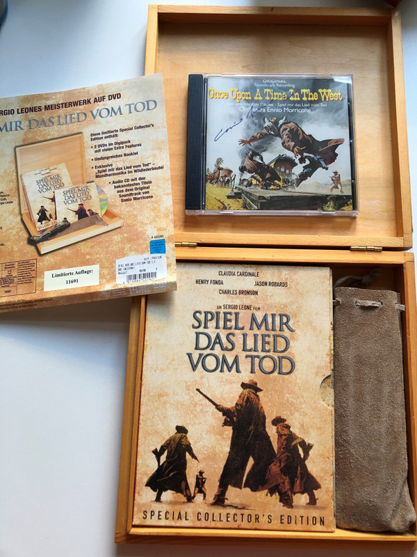 The box is made of wood and besides a 2 disc edition of the movie and the CD it also contains a harmonica