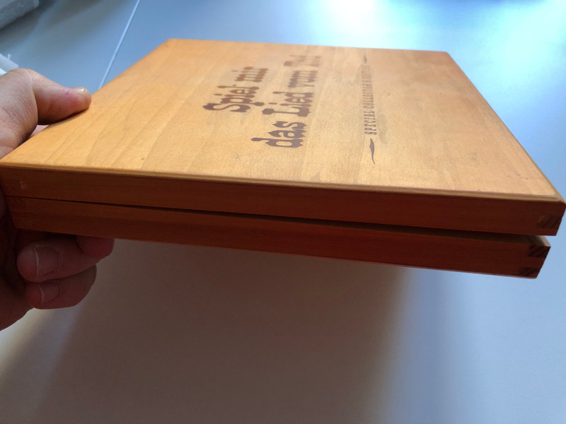 The box is made of wood and besides a 2 disc edition of the movie and the CD it also contains a harmonicaThe box is made of wood and besides a 2 disc edition of the movie and the CD it also contains a harmonica