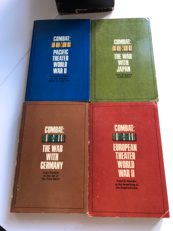 Combat World War II  4 volume set  Dell Publishing Press 1966  Paperback