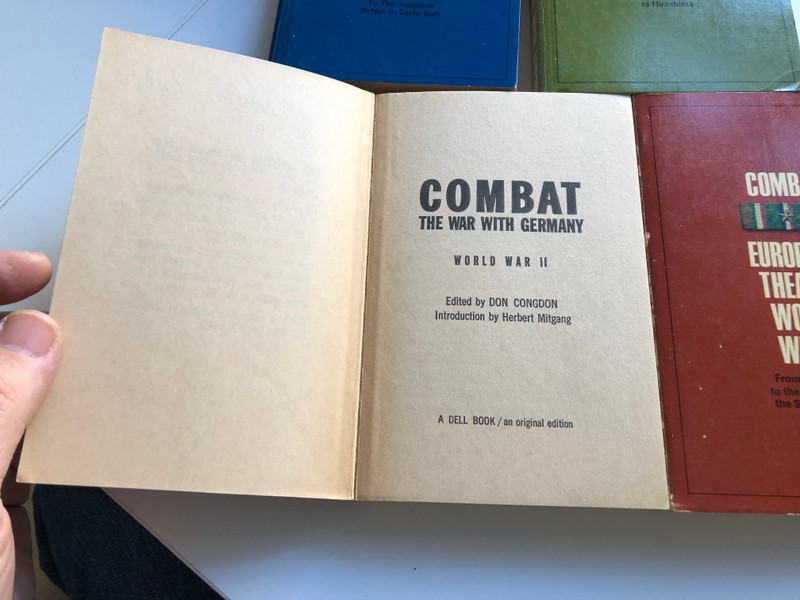 Combat World War II  4 volume set  Dell Publishing Press 1966  Paperback