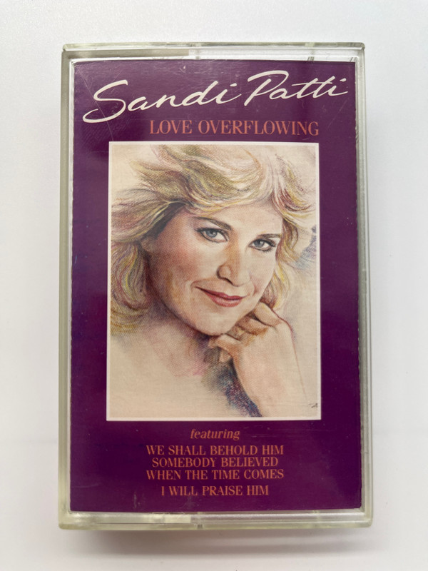 Sandi Patti: Love Overflowing - Featuring: We Shall Behold Him, Somebody Believed, When The Time Comes, I Will Praise Him / Word Audio Cassette 1990 / 7019213502
