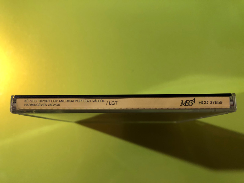 Autographed "Képzelt riport egy amerikai popfesztiválról" / "Harmincéves vagyok" MEGA Music CD (5991813765925.)