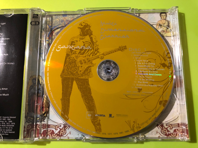 Santana Multi-Dimensional Warrior Autographed 2-CD Set: A Spiritual Musical Journey (886971020427.)