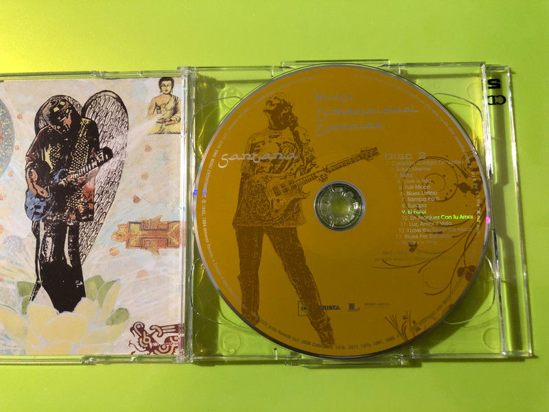 Santana Multi-Dimensional Warrior Autographed 2-CD Set: A Spiritual Musical Journey (886971020427.)