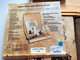 The box is made of wood and besides a 2 disc edition of the movie and the CD it also contains a harmonica