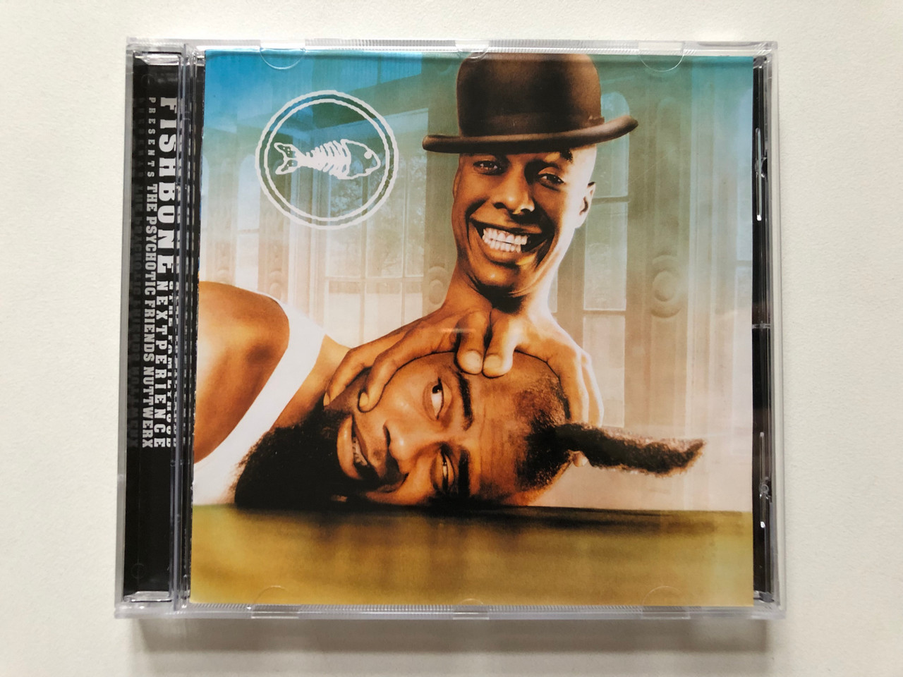 https://cdn11.bigcommerce.com/s-62bdpkt7pb/products/0/images/315027/Fishbone_The_Psychotic_Friends_Nuttwerx_Edel_Audio_CD_2000_0121792HWR_1__10993.1701801933.1280.1280.JPG?c=2