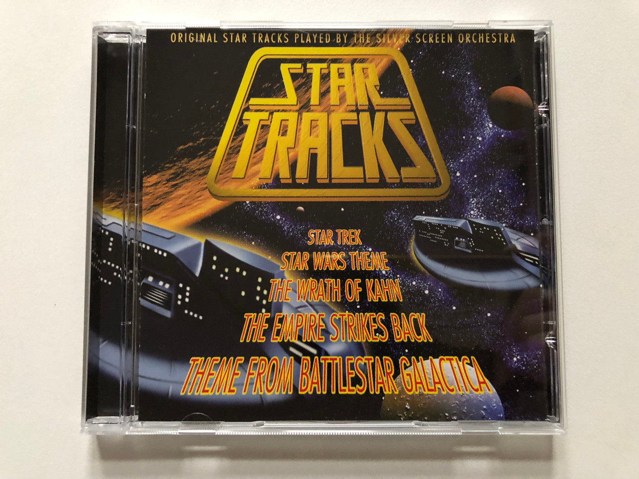 https://cdn11.bigcommerce.com/s-62bdpkt7pb/products/0/images/315041/Star_Tracks_Original_Star_Tracks_Playes_By_The_Silver_Screen_Orchestra_-_Star_Trek_Star_Wars_Theme_The_Wrath_Of_Kahn_The_Empire_Strikes_Back_Theme_From_Battlestar_Galactica_Disky_Audio_CD_1__88021.1701805979.1280.1280.JPG?c=2